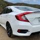 Illustration for article titled The 2019 Honda Civic Sport Is Great Until You Drive the Civic Si
